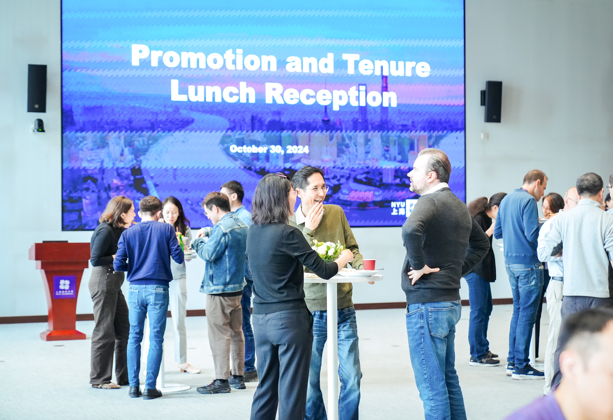 Tenured and tenure track faculty mingling at the Promotion and Tenure Reception