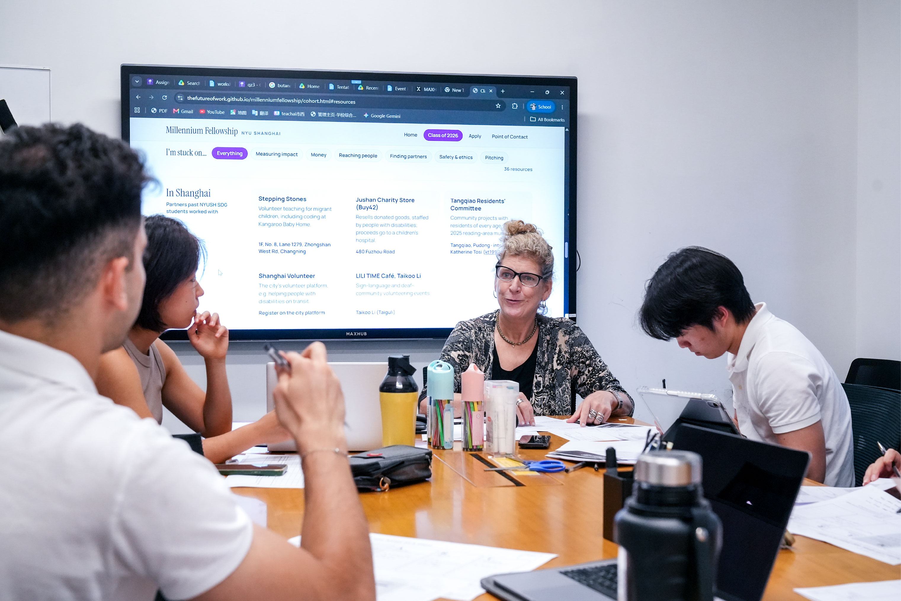English for Academic Purposes Senior Lecturer Katherine Tosi leads a discussion with the fellows