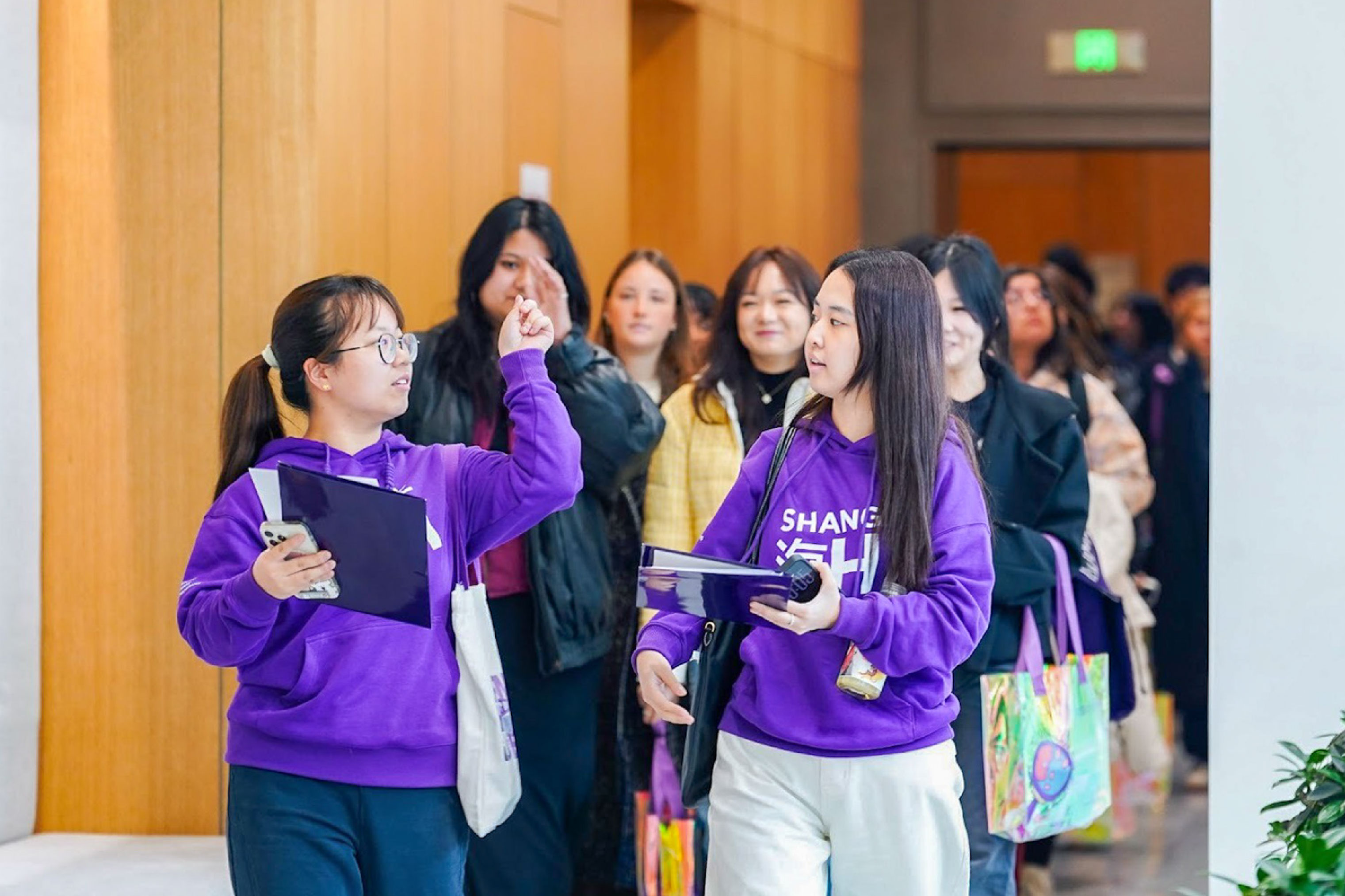 orientation ambassadors leading new study away students around