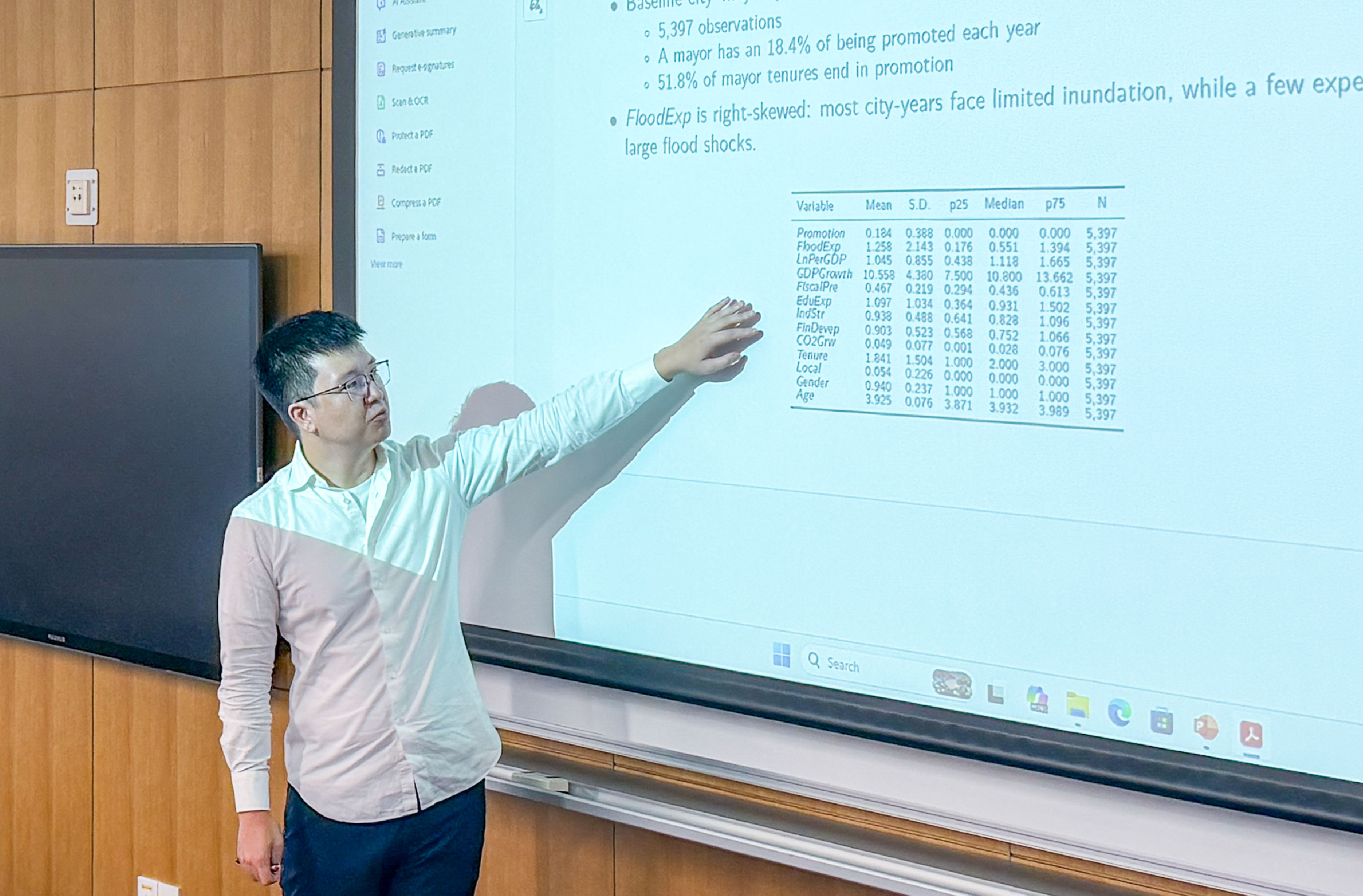 Tong Li of Xiamen University presented a paper on climate laws and their impact on cross-border mergers and acquisitions