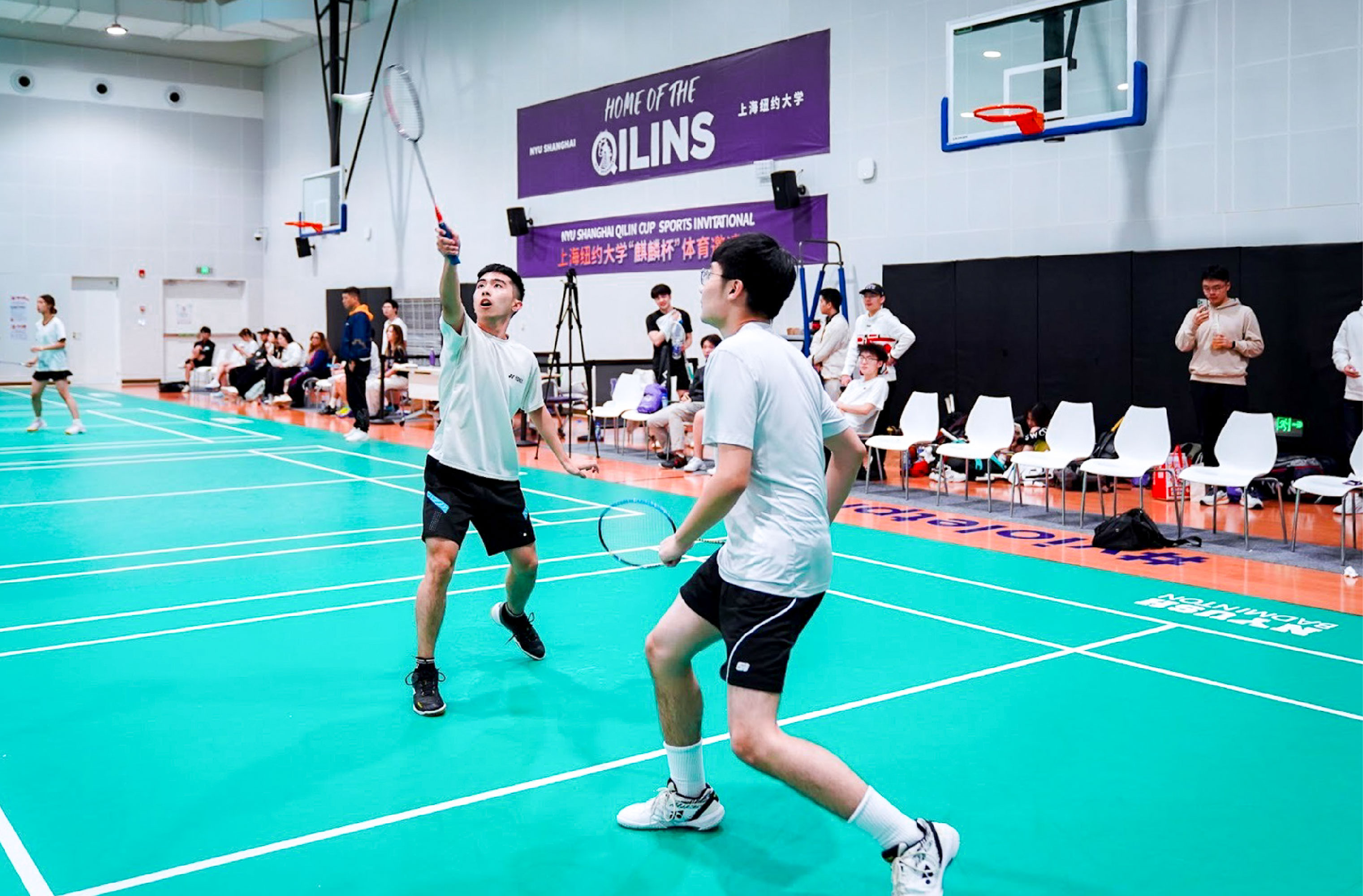 The badminton team playing at the NYU Shanghai Qilin Cup Sports Invitational