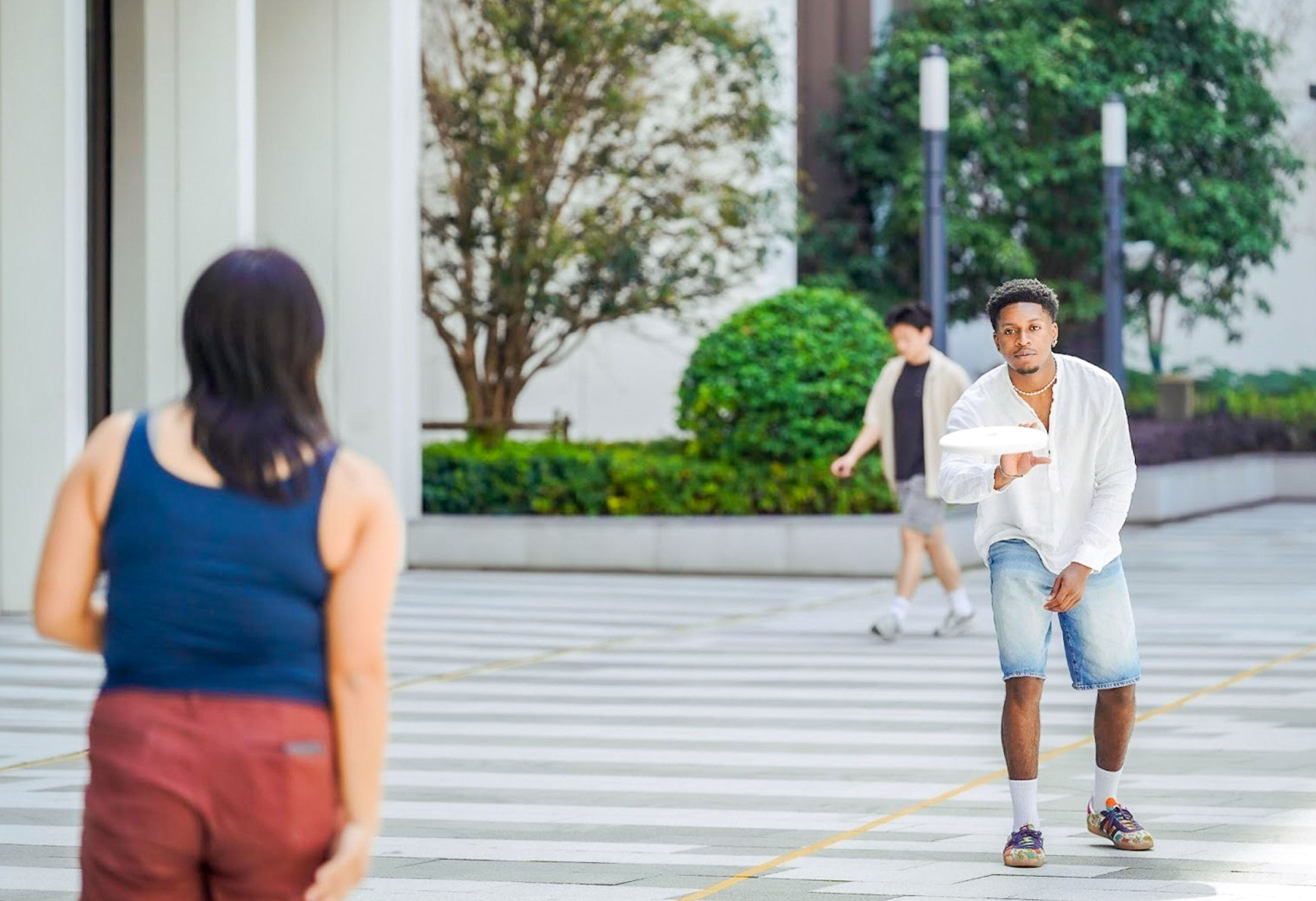 playing frisbee on the quad