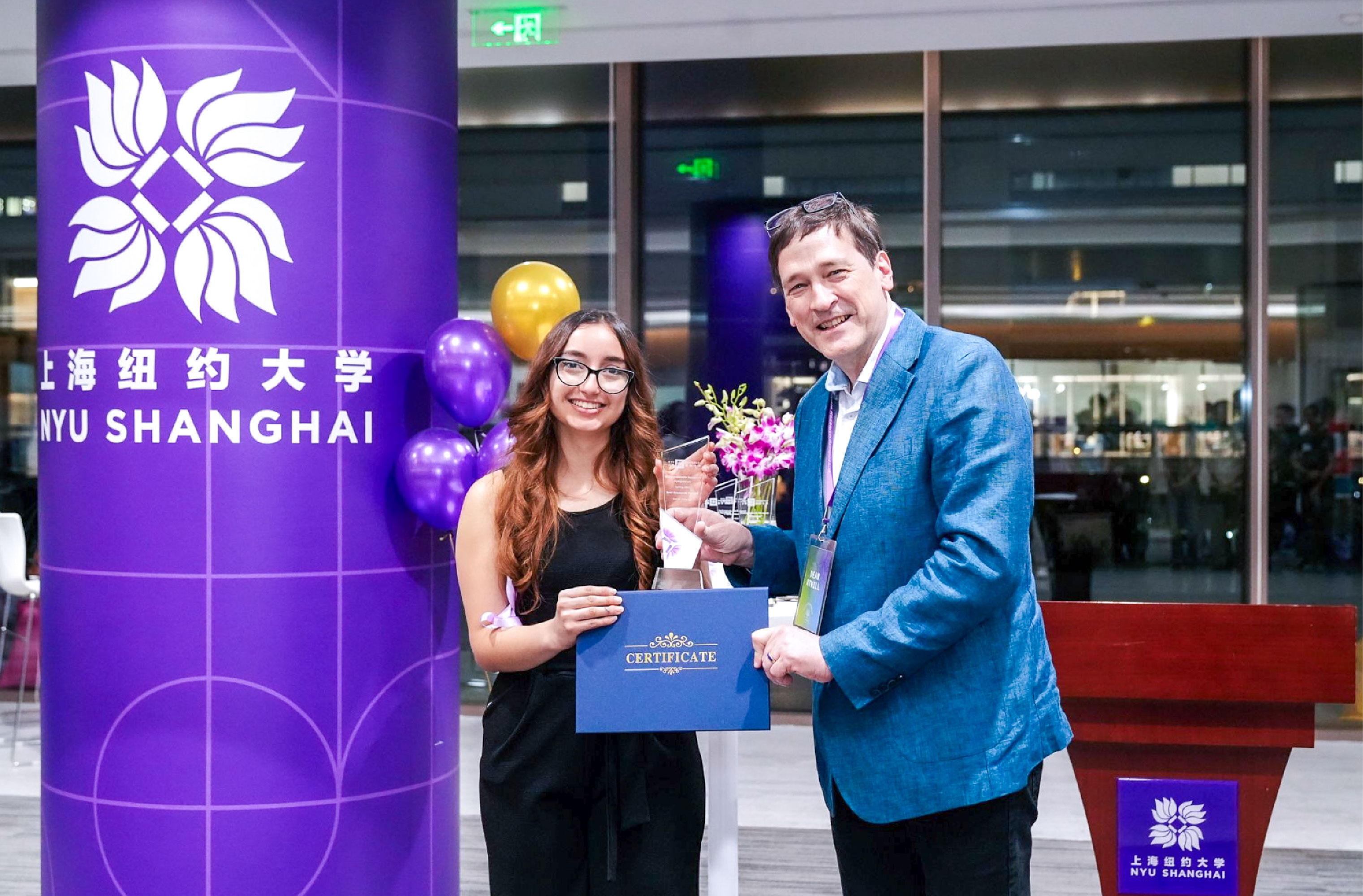 mya hasbun accepting her award