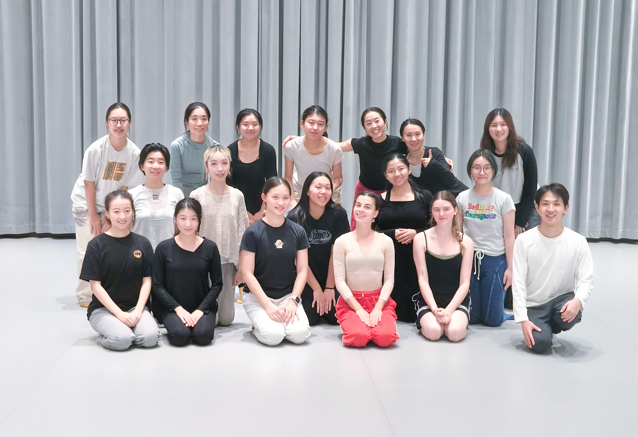 dance workshop participants posing with instructor