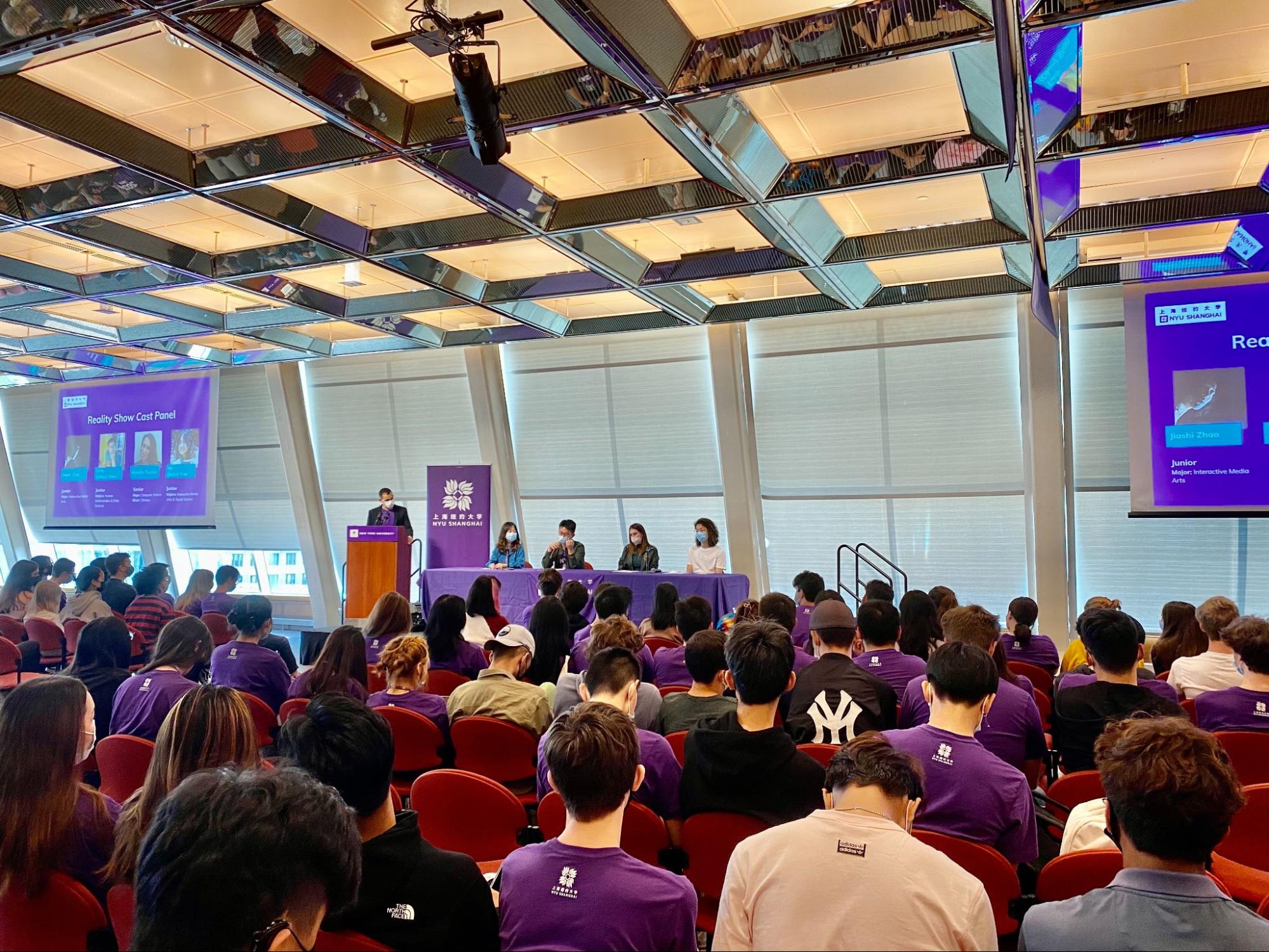 Students in New York watch the Reality Show together and then sit and watch a panel discussion