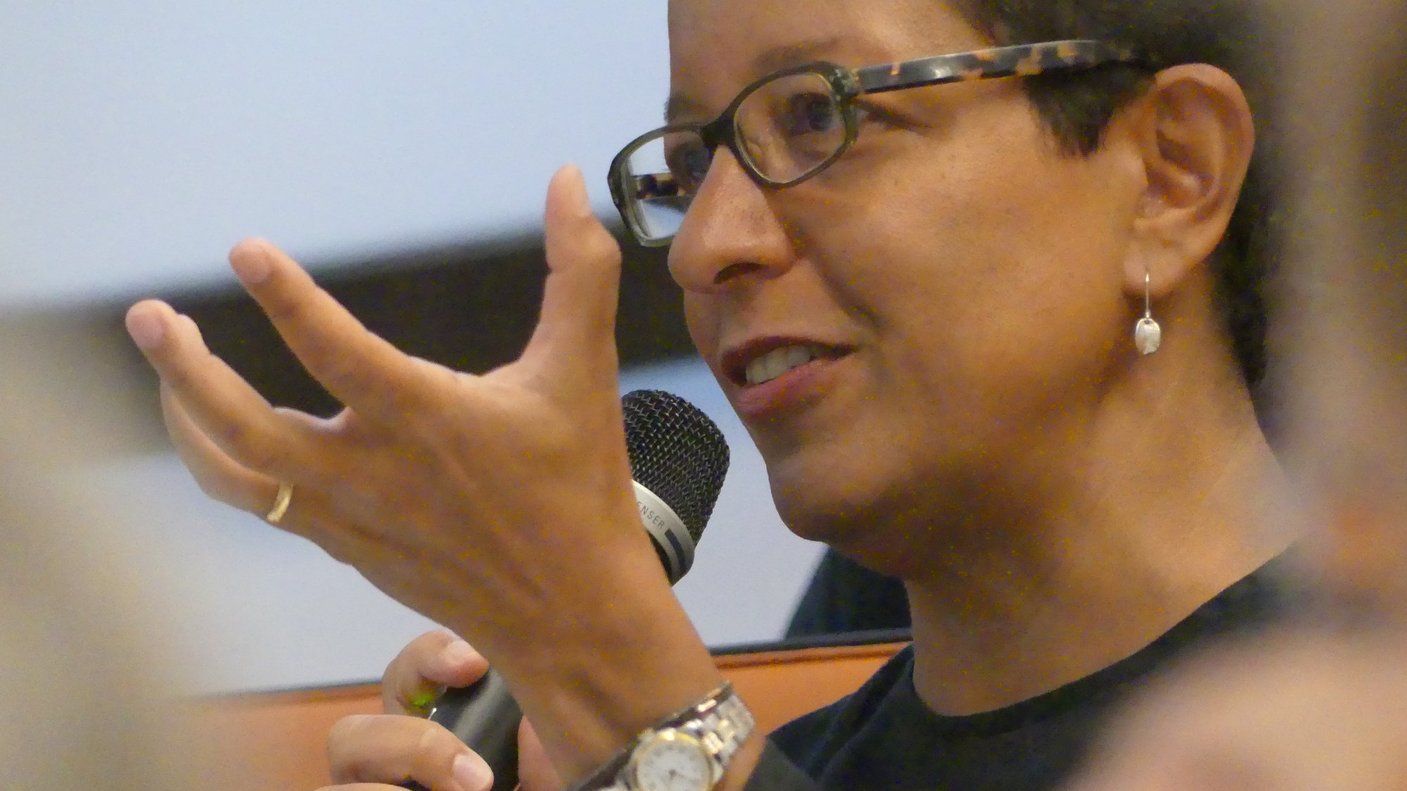 Almaz Zelleke asking a question at a conference