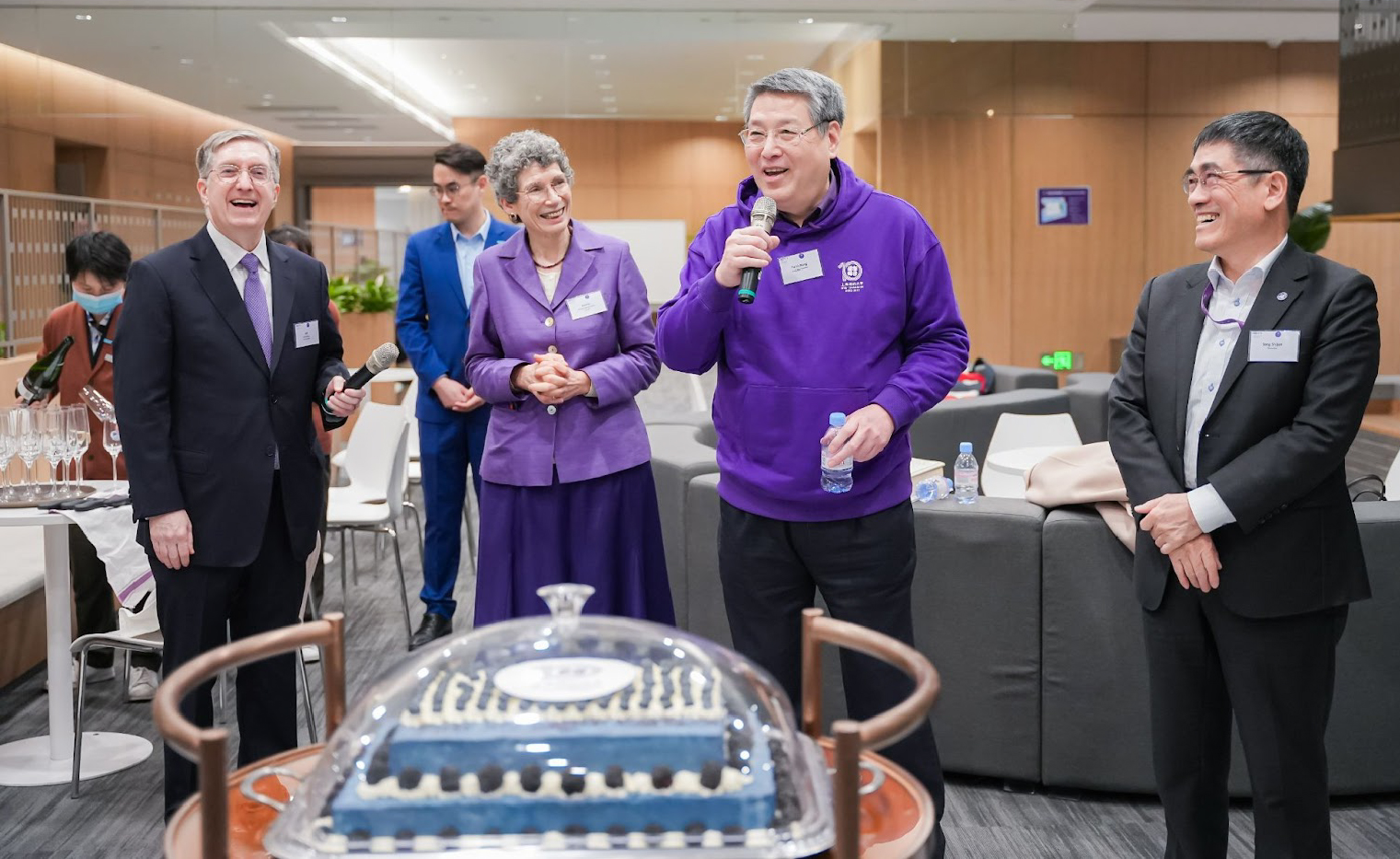 NYU Shanghai leadership give remarks at the alumni cohort reunion