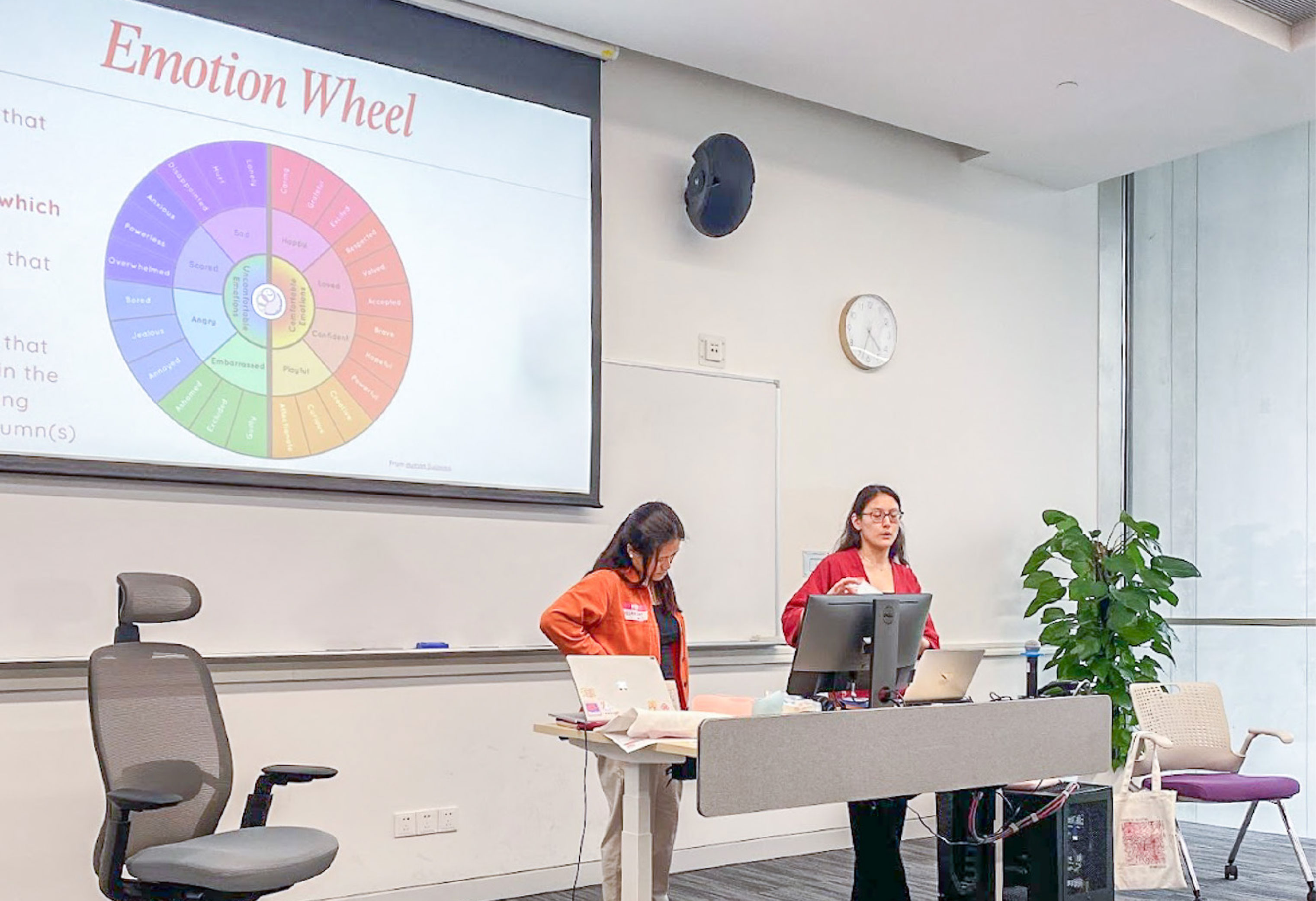 Megan Schellong (left) and Yuechi Kelly (right) presenting a session on “Adoptee Language and Power” on April 27 at the Second Annual Adoptee Symposium on the New Bund campus. photo credit: Tong Zhou Lafrance 