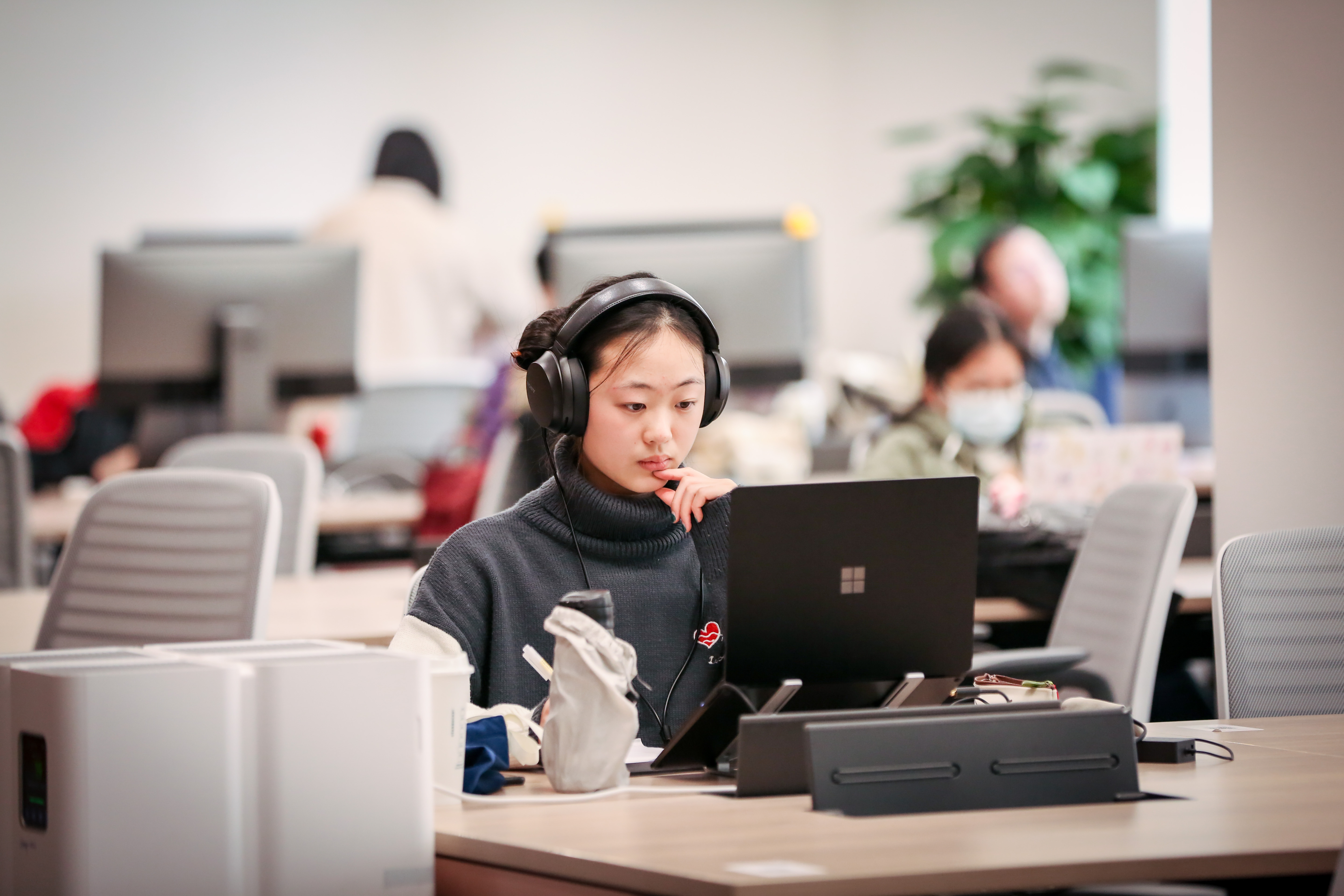 student working in library