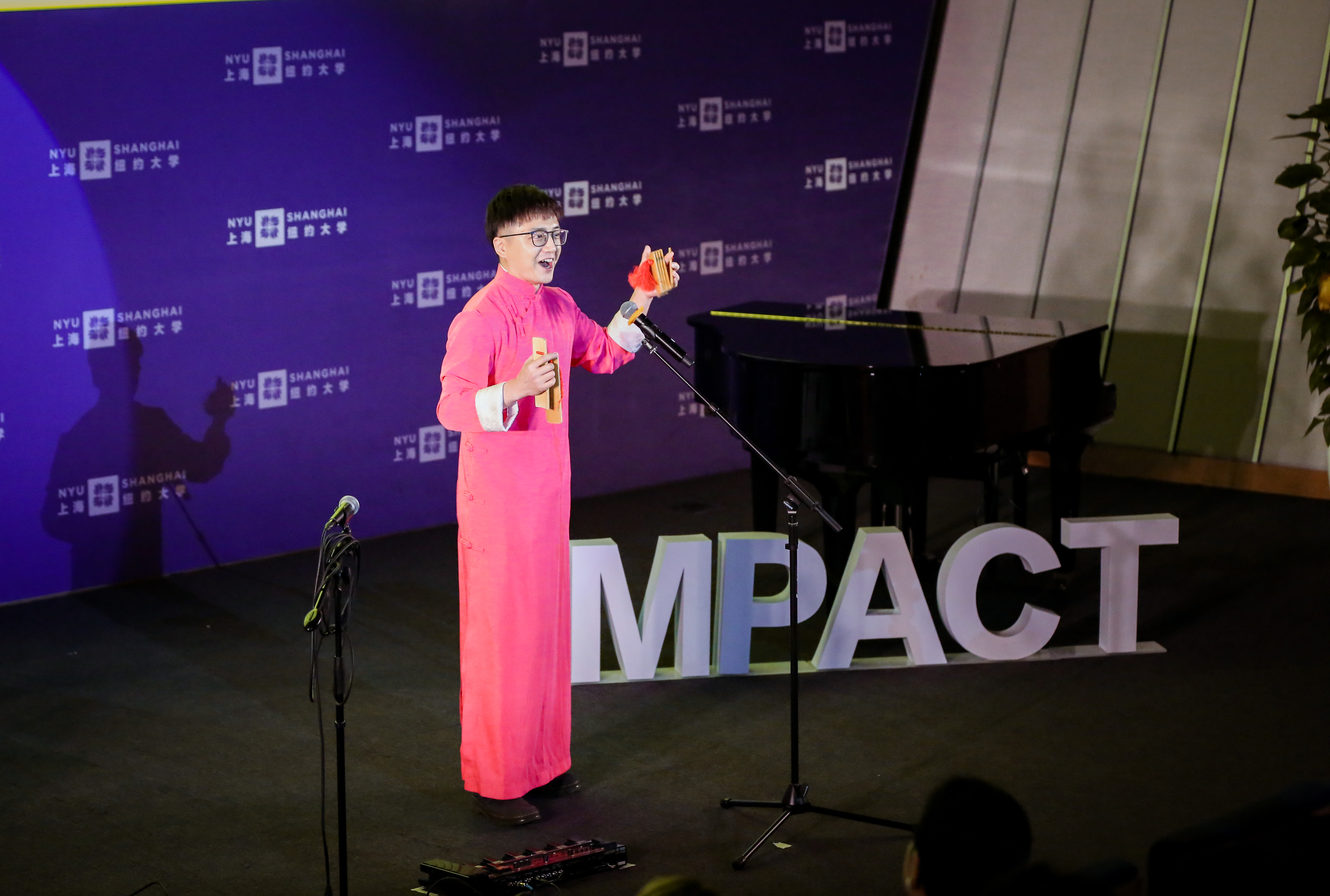 Yuchen Jin plays the bamboo clapper