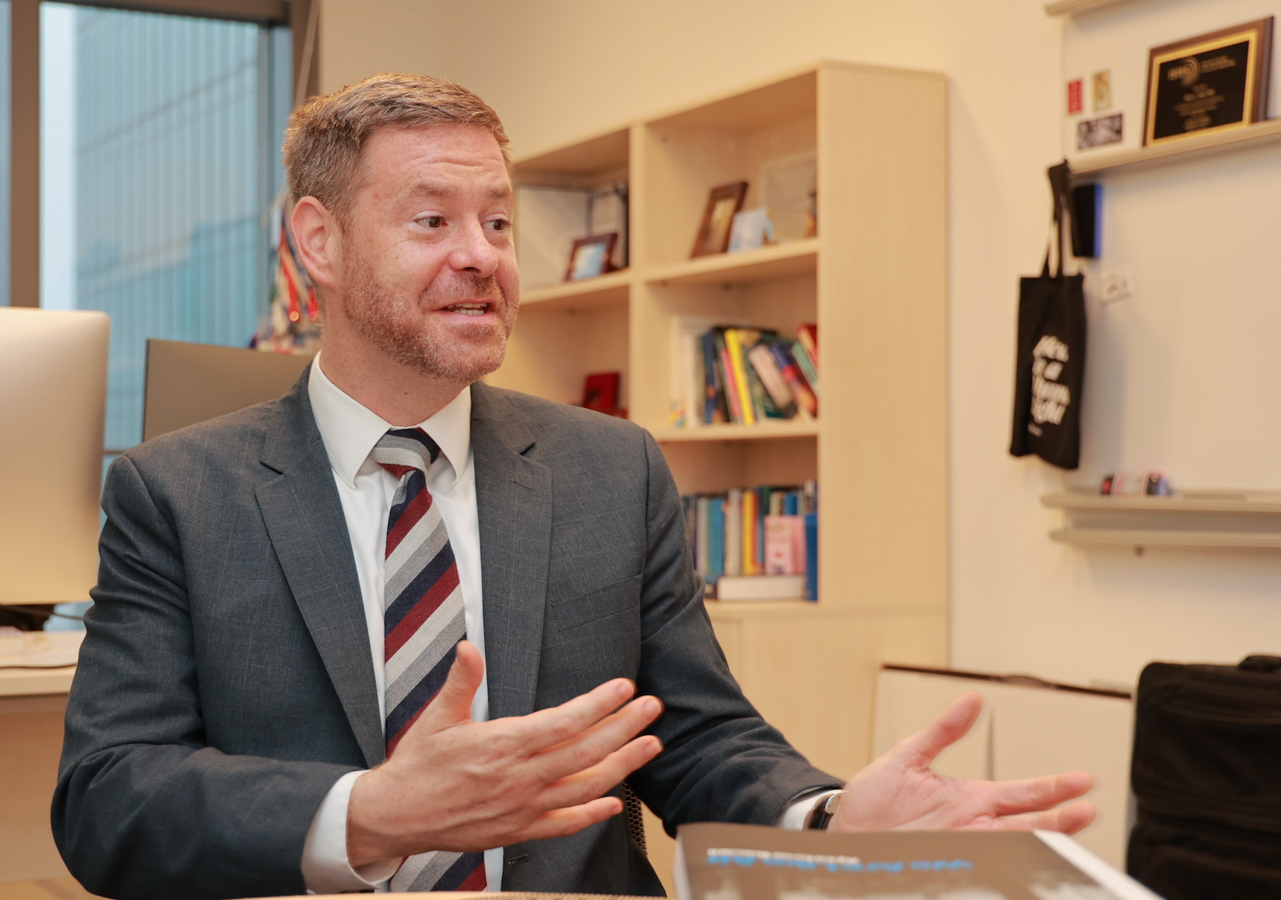 Hall in his office at NYU Shanghai