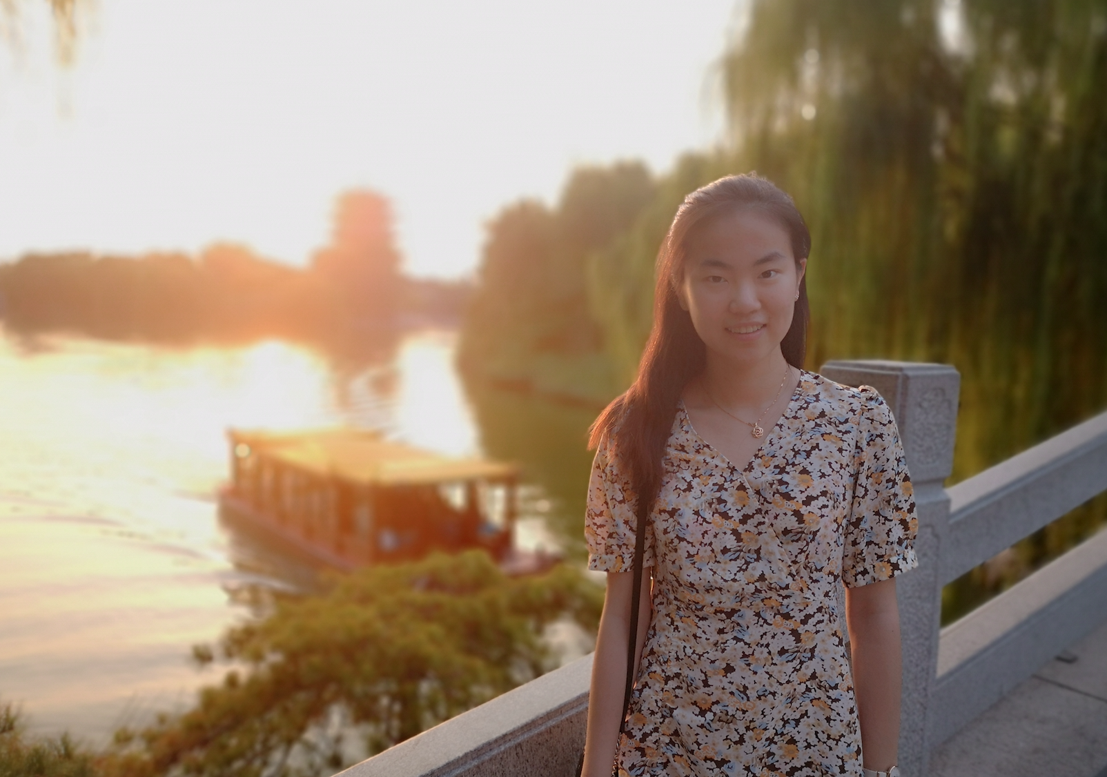 Standing by canal at sunset