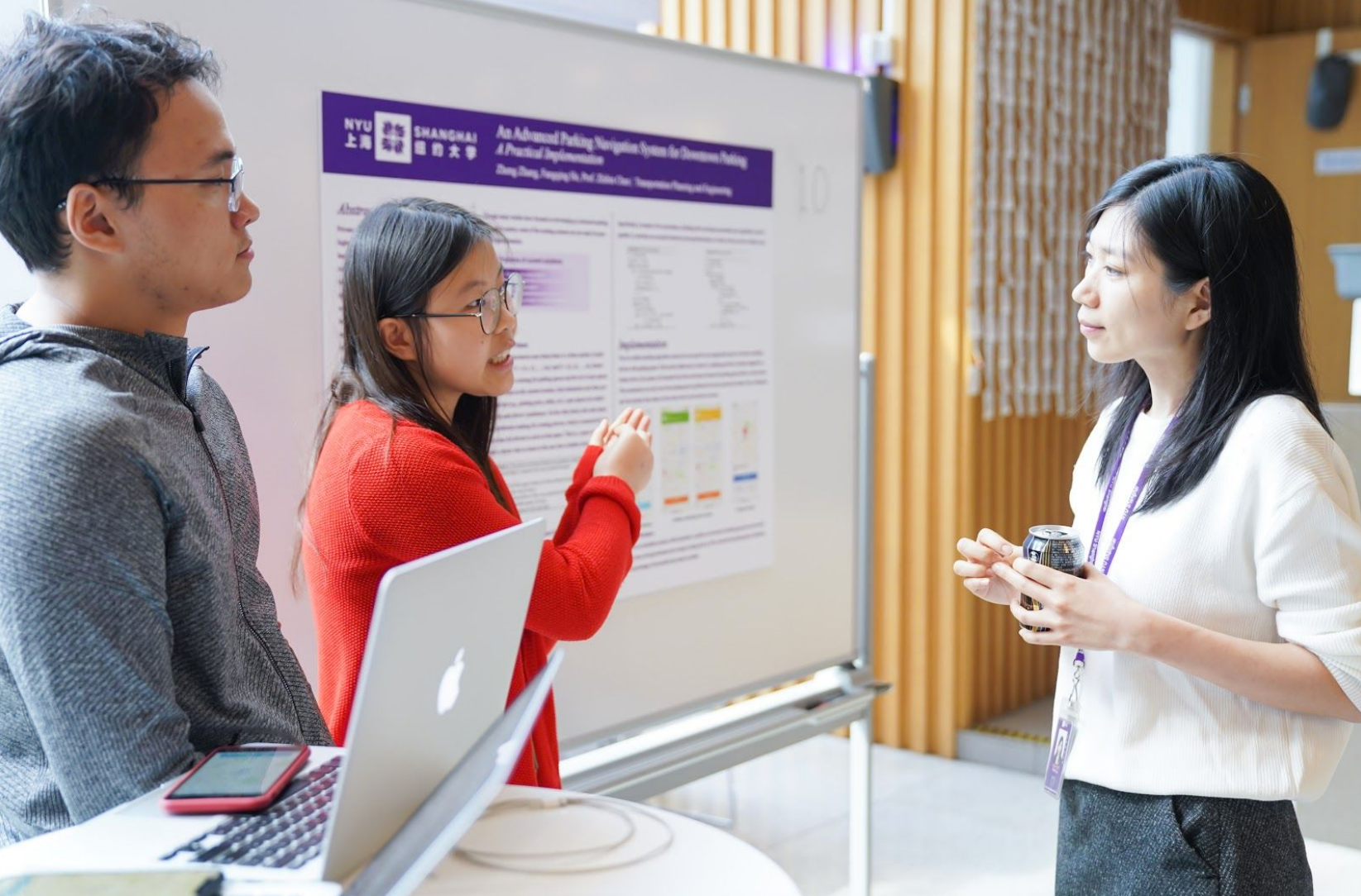 He Fangqing and Zhang Zheng presenting at the Undergraduate Research Expo and Poster Competition