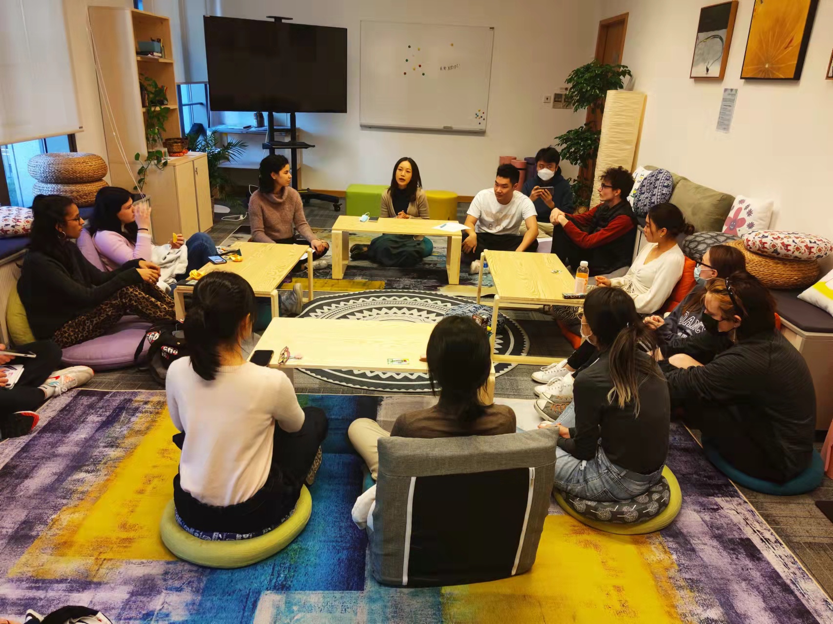 students sitting in a workshop circle