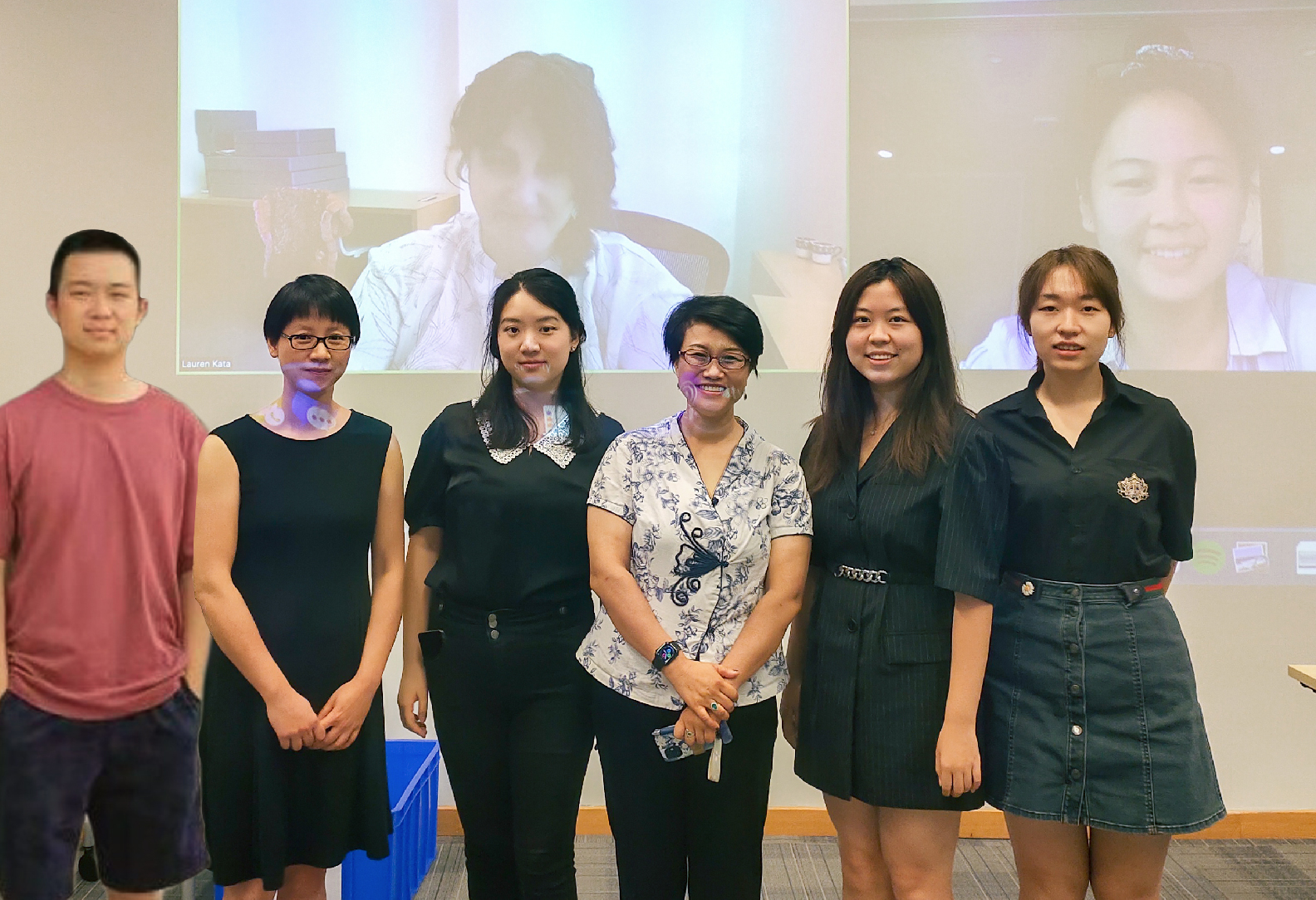 Student researchers gather with mentors for a group photo