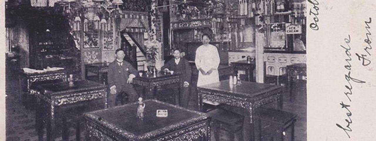Historical photo of richly decorated Chinese restaurant in late 19th century