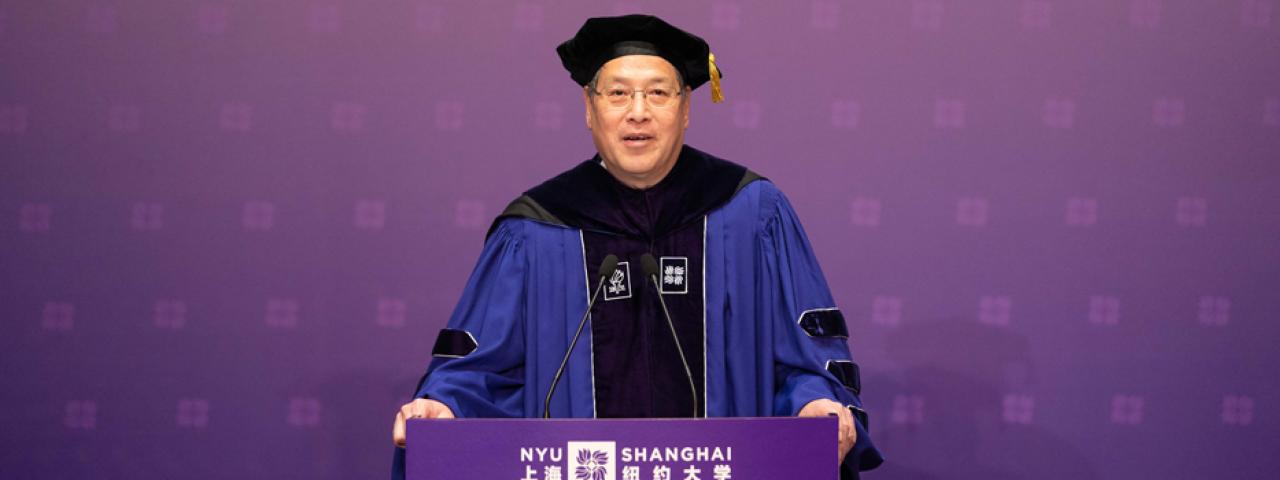Yu at podium