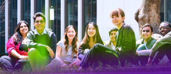 NYU Shanghai students sitting on the lawn in the courtyard at the New Bund Campus