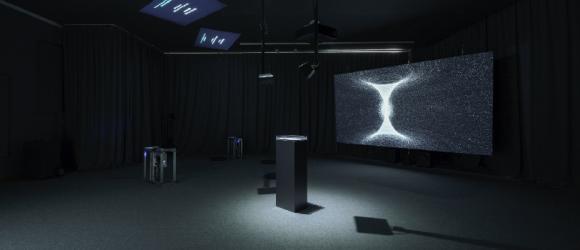 A dark photo of the exhibit. 