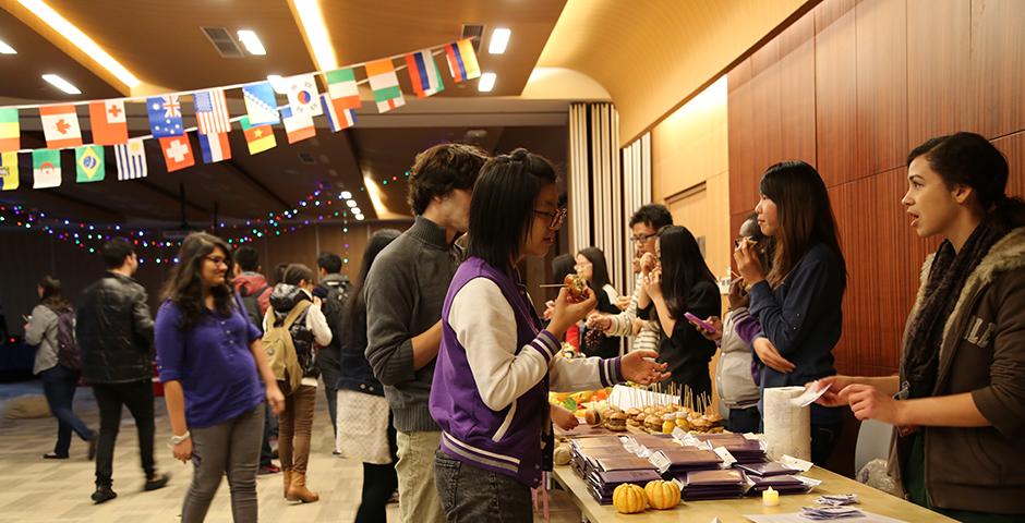 Students explore NYU&#039;s global sites at the World Bazaar. November 13, 2014. (Photo by Tong Wu)