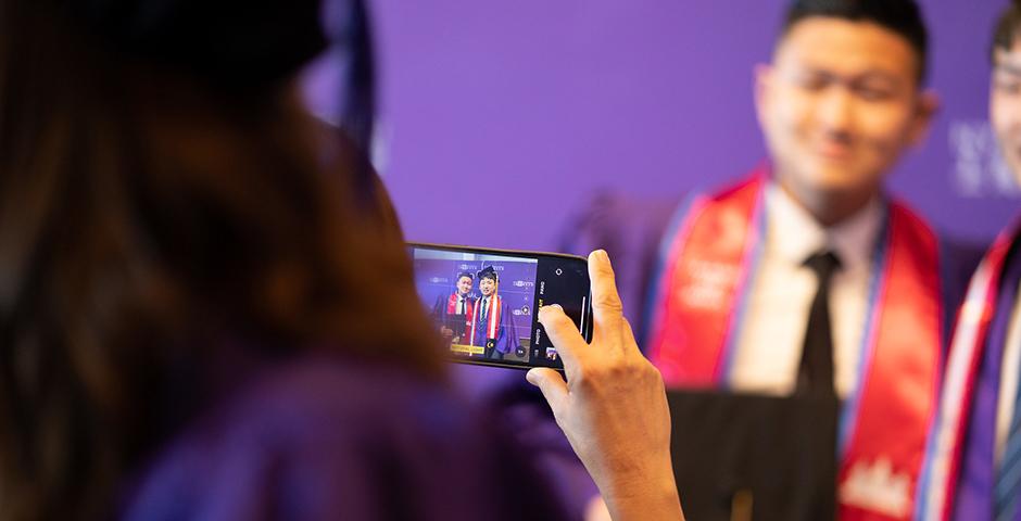 Koc Heang Lim '23 (left), Lucas Goh '23. ©Myaskovsky: Courtesy of NYU Photo Bureau
