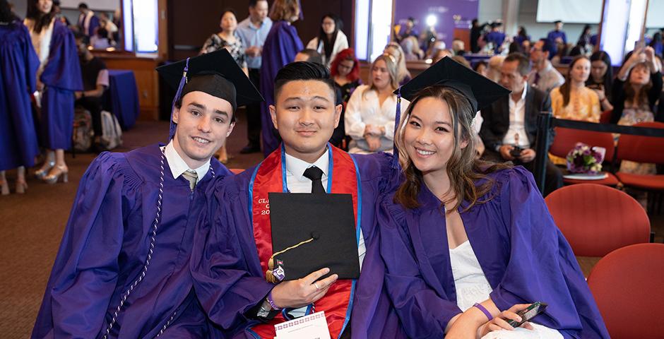 Marcos Brisson '23 (left), Koc Heang Lim '23, Lorna Louie '23. ©Myaskovsky: Courtesy of NYU Photo Bureau