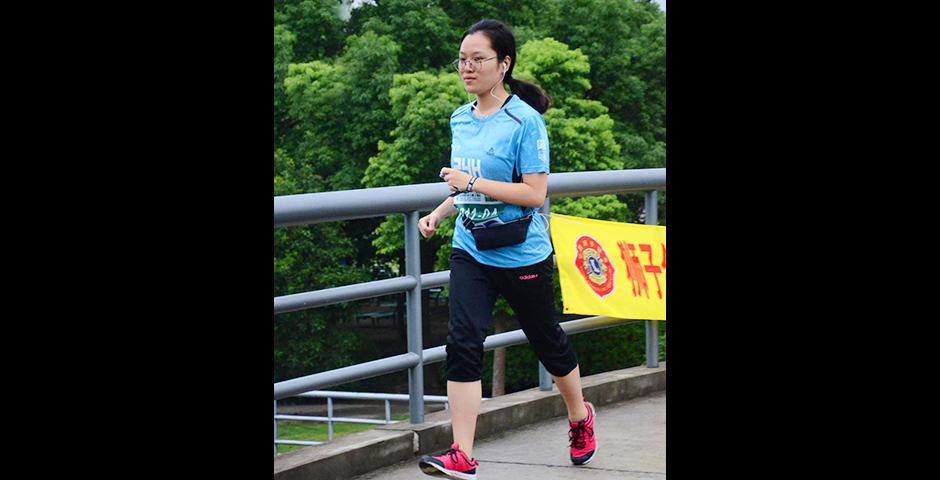 Despite the weather, 11 members of NYU Shanghai’s staff and faculty team held on strong straight to the end of this 24-hour relay marathon. (Photo by: NYU Shanghai)
