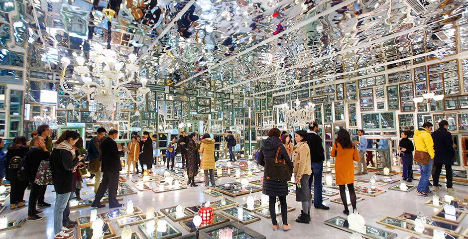 Chinese artist Song Dong's solo exhibition opening on March 11 at the NYU Shanghai Art Gallery featured a gridded installation of frames and mirrors, creating an intimate yet elliptical composite portrait.  (Photo by: NYU Shanghai)