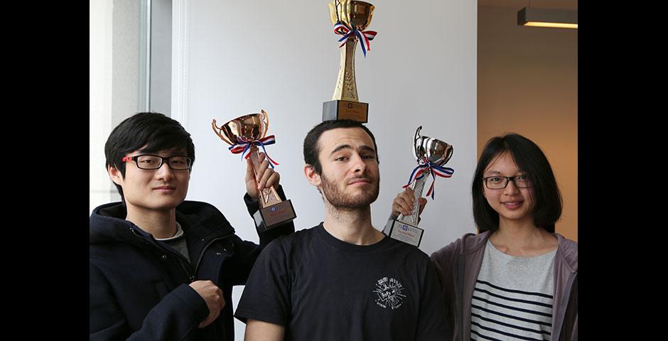 To celebrate Pi Day 2015, Math Society awarded slices of pie to students who could recite over 11 digits of pi. Congratulations to Omer Cohen (207 digits), Ziyuan Huang (100 digits), and Siyao Fang (83 digits), who placed first, second, and third, respectively. March 16, 2015. (Photo by Sunyi Wang)