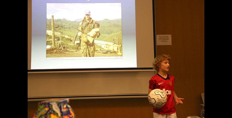 As part of Ally Week 2015, young soccer fan and player Mac Millar speaks at NYU Shanghai on promoting peace through his favorite sport. April 13, 2015. (Photo by Annie Seaman)