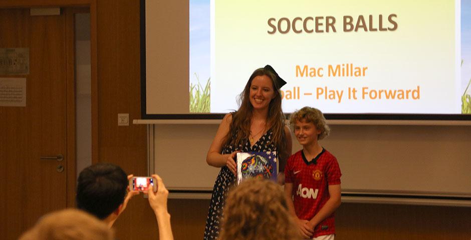 As part of Ally Week 2015, young soccer fan and player Mac Millar speaks at NYU Shanghai on promoting peace through his favorite sport. April 13, 2015. (Photo by Annie Seaman)