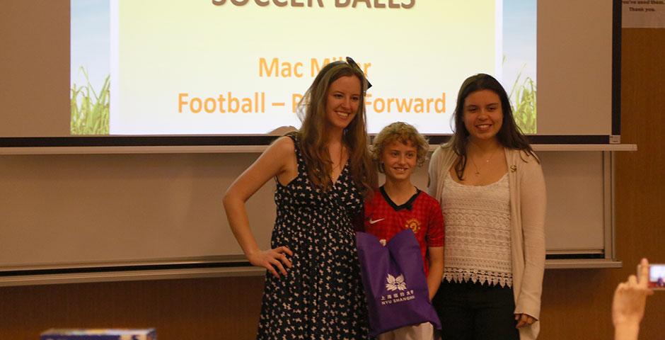 As part of Ally Week 2015, young soccer fan and player Mac Millar speaks at NYU Shanghai on promoting peace through his favorite sport. April 13, 2015. (Photo by Annie Seaman)