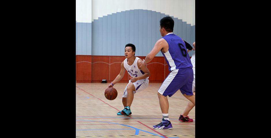 NYU Shanghai faces off against Duke Kunshan University in women's volleyball and men's basketball as part of Viva La Violet Week. April 18, 2015. (Photo by Dylan J Crow)