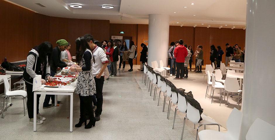 NYU Shanghai students kicked off the Spring 2015 semester with a variety of fruits at the official Welcome Back Mixer. January 26, 2015. (Photo by Sunyi Wang)