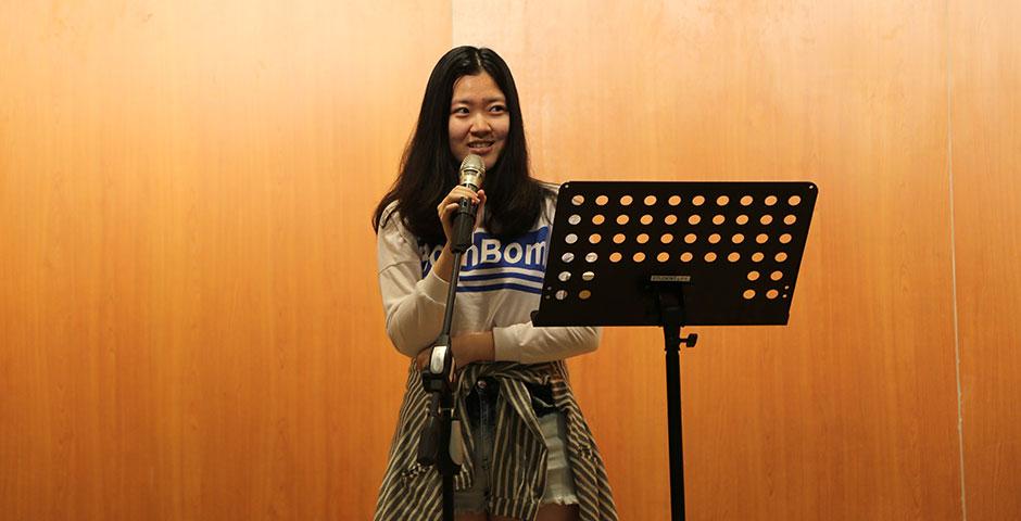 Members of Changing Octaves, an NYU Shanghai Residential Life music program, gather for a mid-week floor event. April 29, 2015. (Photo by Sunyi Wang)