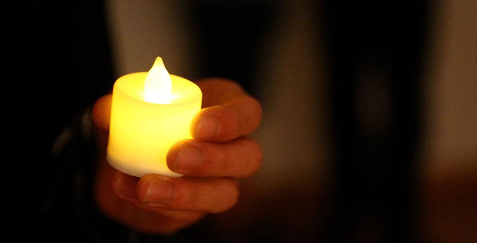 The NYU Shanghai community honors those impacted by the devastating Nepal earthquake with a candlelight vigil and a benefit event hosted in conjunction with the Rotary of Shanghai. May 4, 2015. (Photo by Sunyi Wang)