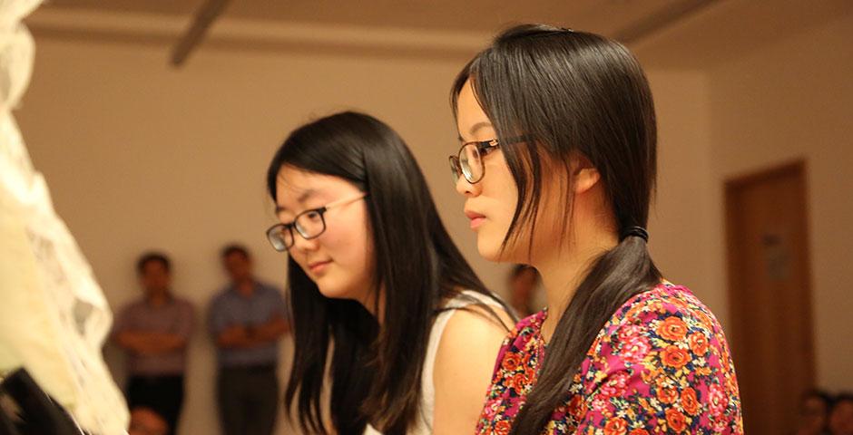 The NYU Shanghai community honors those impacted by the devastating Nepal earthquake with a candlelight vigil and a benefit event hosted in conjunction with the Rotary of Shanghai. May 4, 2015. (Photo by Sunyi Wang)