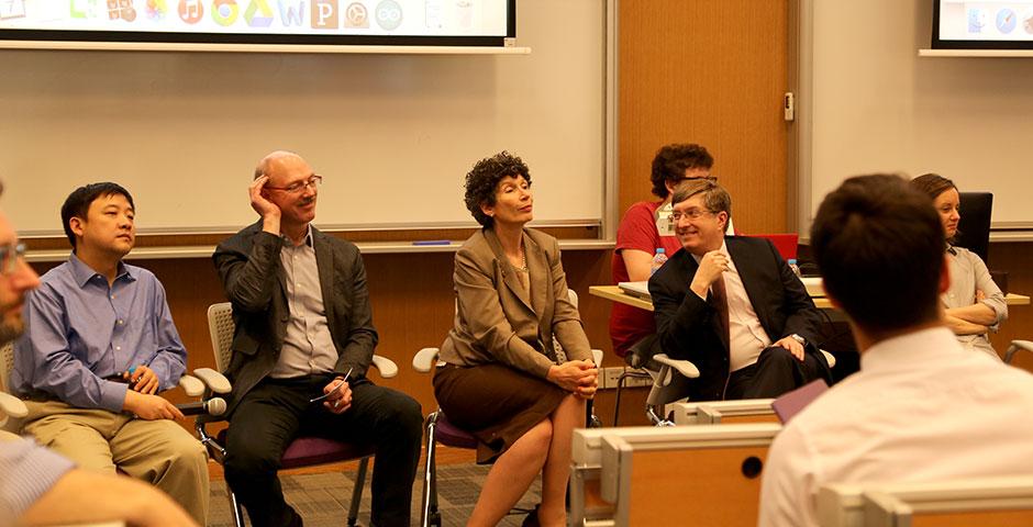 NYU Shanghai faculty gather for a forum discussion covering important academic topics such as major requirements, study away restrictions, e-books, and more. May 7, 2015. (Photo by Annie Seaman)
