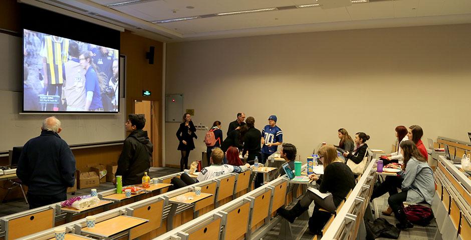Students and faculty gathered bright and early to cheer on the Seahawks and Patriots for Super Bowl XLIX. February 2, 2015. (Photo by Annie Seaman)