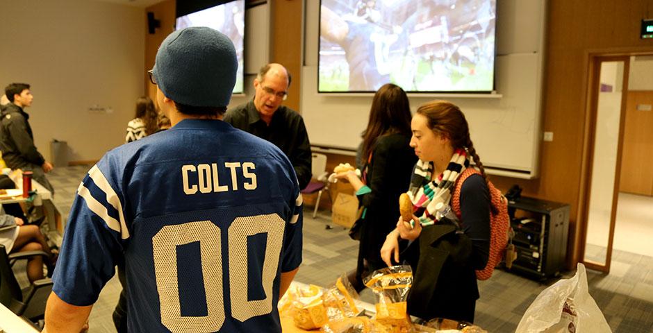 Students and faculty gathered bright and early to cheer on the Seahawks and Patriots for Super Bowl XLIX. February 2, 2015. (Photo by Annie Seaman)