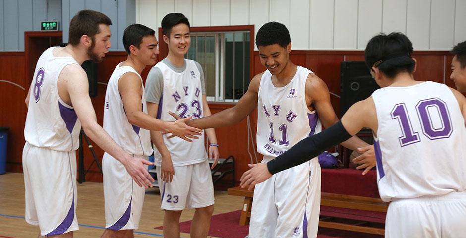 NYU Shanghai faces off against Duke Kunshan University in women's volleyball and men's basketball as part of Viva La Violet Week. April 18, 2015. (Photo by Sunyi Wang)