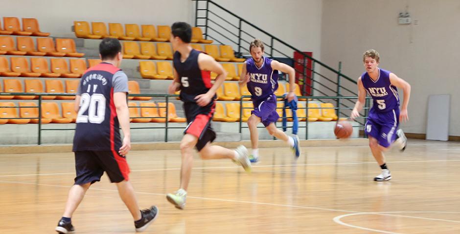 The NYU Shanghai Men's basketball team went toe to toe with Shanghai Normal University on March 5, with the game rallying to a tie at 74-74. (Photo by: Annie Seaman)