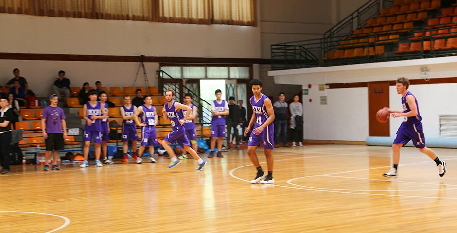 The NYU Shanghai Men's basketball team went toe to toe with Shanghai Normal University on March 5, with the game rallying to a tie at 74-74. (Photo by: Annie Seaman)