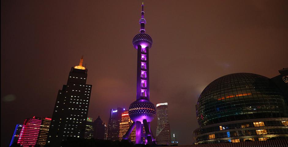 On May 22, the Oriental Pearl Tower shone violet for the graduating class of 2018. （Photo by: NYU Shanghai）