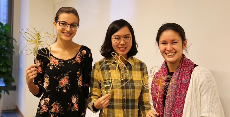 NYU Shanghai students learned the Chinese folk art of sugar painting, a craft which uses melted sugar to create traditional animal and plant figures. Two Shanghainese sugar artists instructed students at the October 26 event. (Photo by: Wenqian Hu)