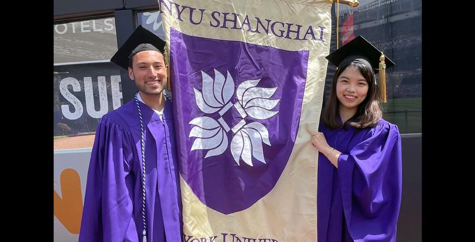 159 members of NYU Shanghai’s Class of 2022 and more than 76 members of the Classes of 2020 and Class of 2021 reunited at Yankee Stadium in New York City for NYU’s All-University Commencement on May 18, 2022. Here student representatives Matthew Fertig ’22 and Shen Mengjian ’22 pose with the NYU Shanghai banner.