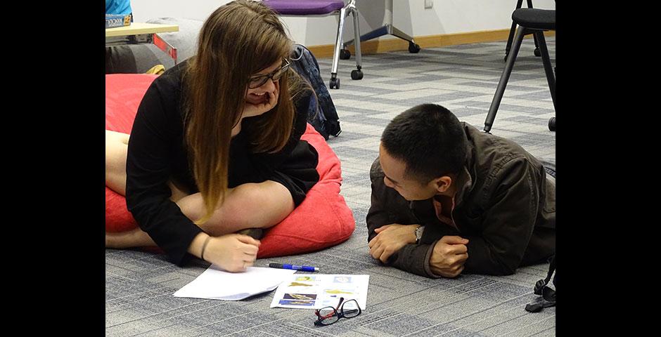 NYU Shanghai and NYU Abu Dhabi students battled each other in the first-ever Game Off competition, featuring Pictionary, charades, trivia contests, and board games. April 16, 2015. (Photo by Danni Wang)