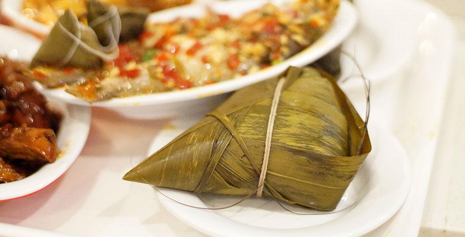 The NYU Shanghai community celebrates Dragon Boat Festival with traditional zongzi and colorful satchets. June 19, 2015. (Photo by Charlotte San Juan)