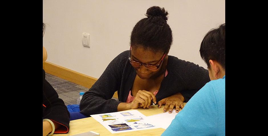 NYU Shanghai and NYU Abu Dhabi students battled each other in the first-ever Game Off competition, featuring Pictionary, charades, trivia contests, and board games. April 16, 2015. (Photo by Danni Wang)