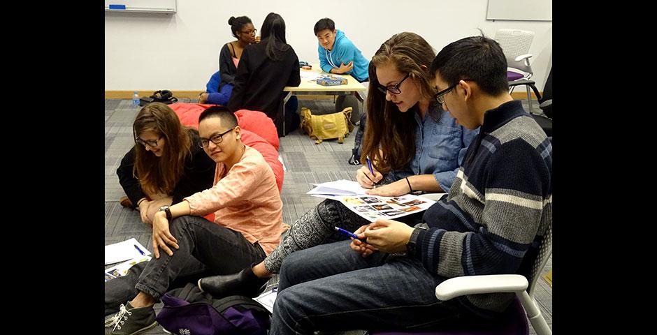 NYU Shanghai and NYU Abu Dhabi students battled each other in the first-ever Game Off competition, featuring Pictionary, charades, trivia contests, and board games. April 16, 2015. (Photo by Danni Wang)